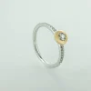 ANILLO BICOLOR ORO 18 KILATES CON DIAMANTE