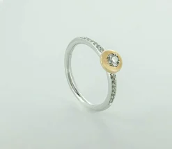 ANILLO BICOLOR ORO 18 KILATES CON DIAMANTE