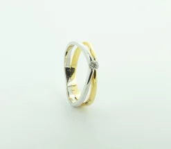 ANILLO BICOLOR ORO 18 KILATES CON DIAMANTE