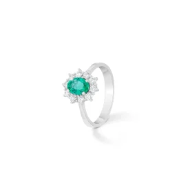 ANILLO ORO 18 KILATES CON DIAMANTES Y ESMERALDA
